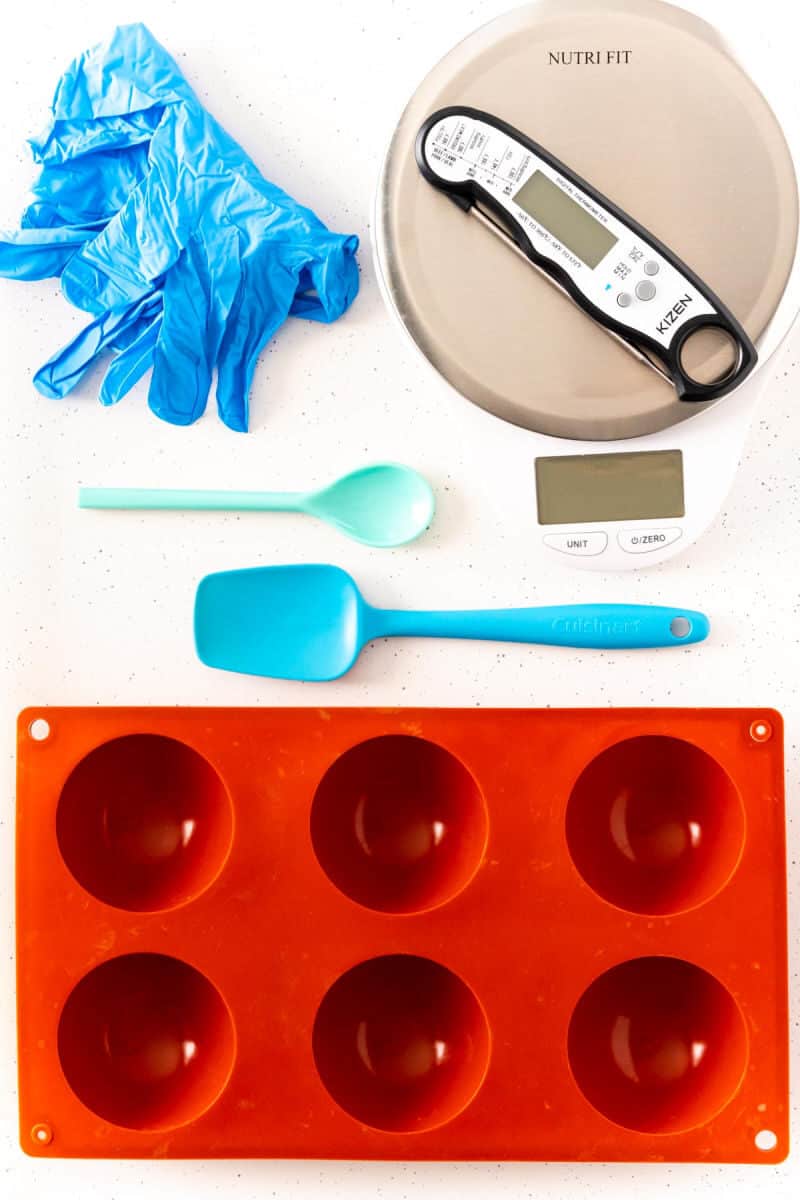 equipment to make hot chocolate bombs laid out on a countertop
