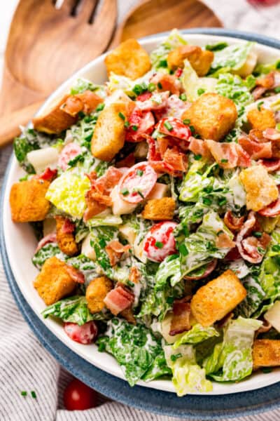 plated BLT salad topped with croutons