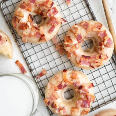 square image of maple bacon donuts on a wire rack