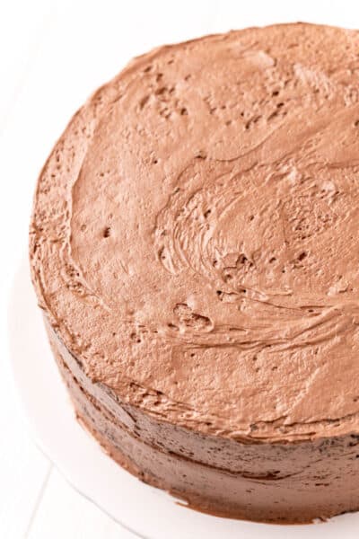 crumb coat frosted chocolate cake