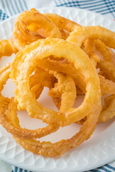 onion rings piled up on a plate
