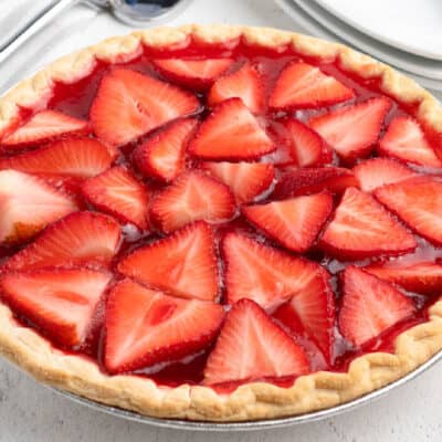 square close up of strawberry pie