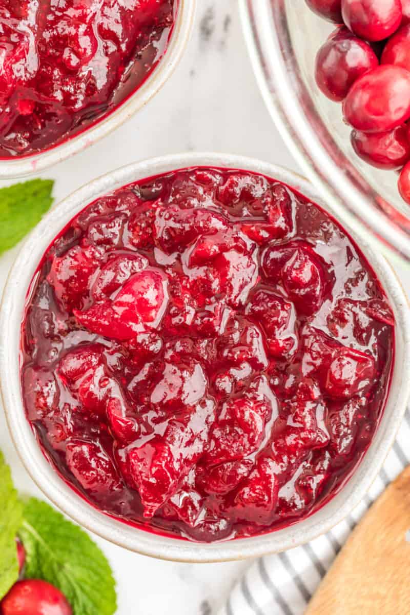 close up of a serving bowl of homemade cranberry sauce