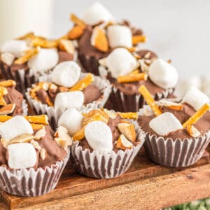 square image of rocky road candy bites on a wooden tray