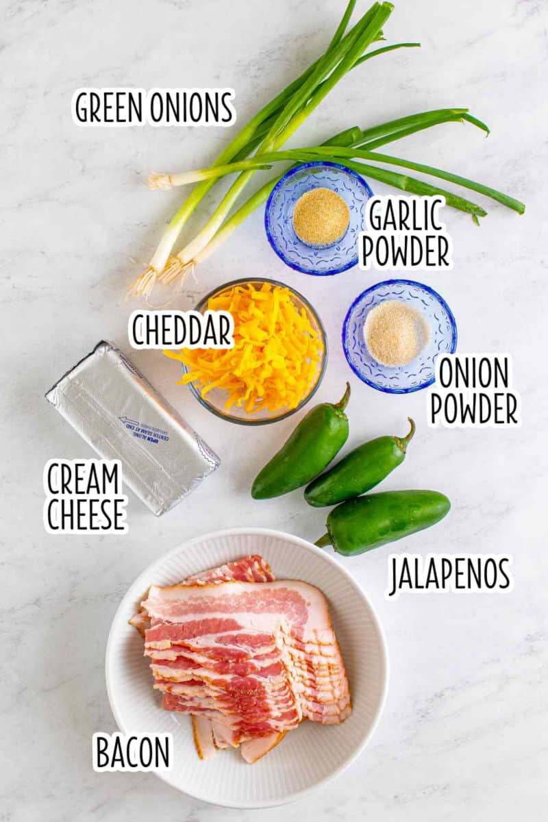 ingredients to make bacon wrapped jalapeno poppers laid out on a counter