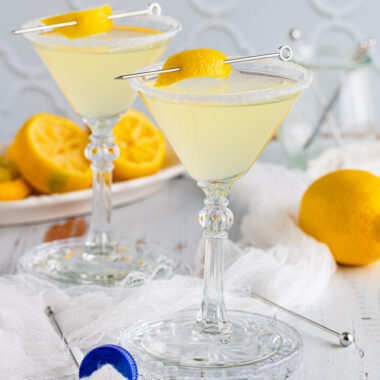 square image of lemon drop martinis next to lemons
