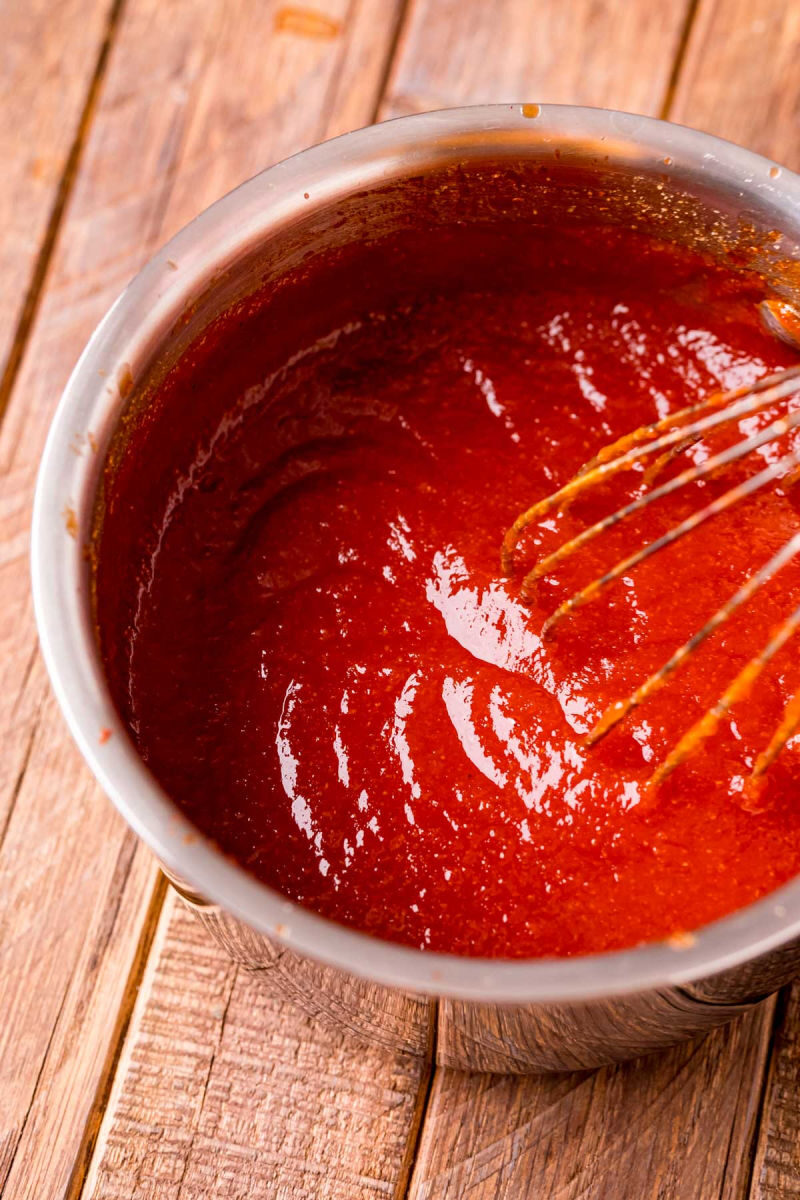 ketchup ingredients after being whisked together in a saucepan
