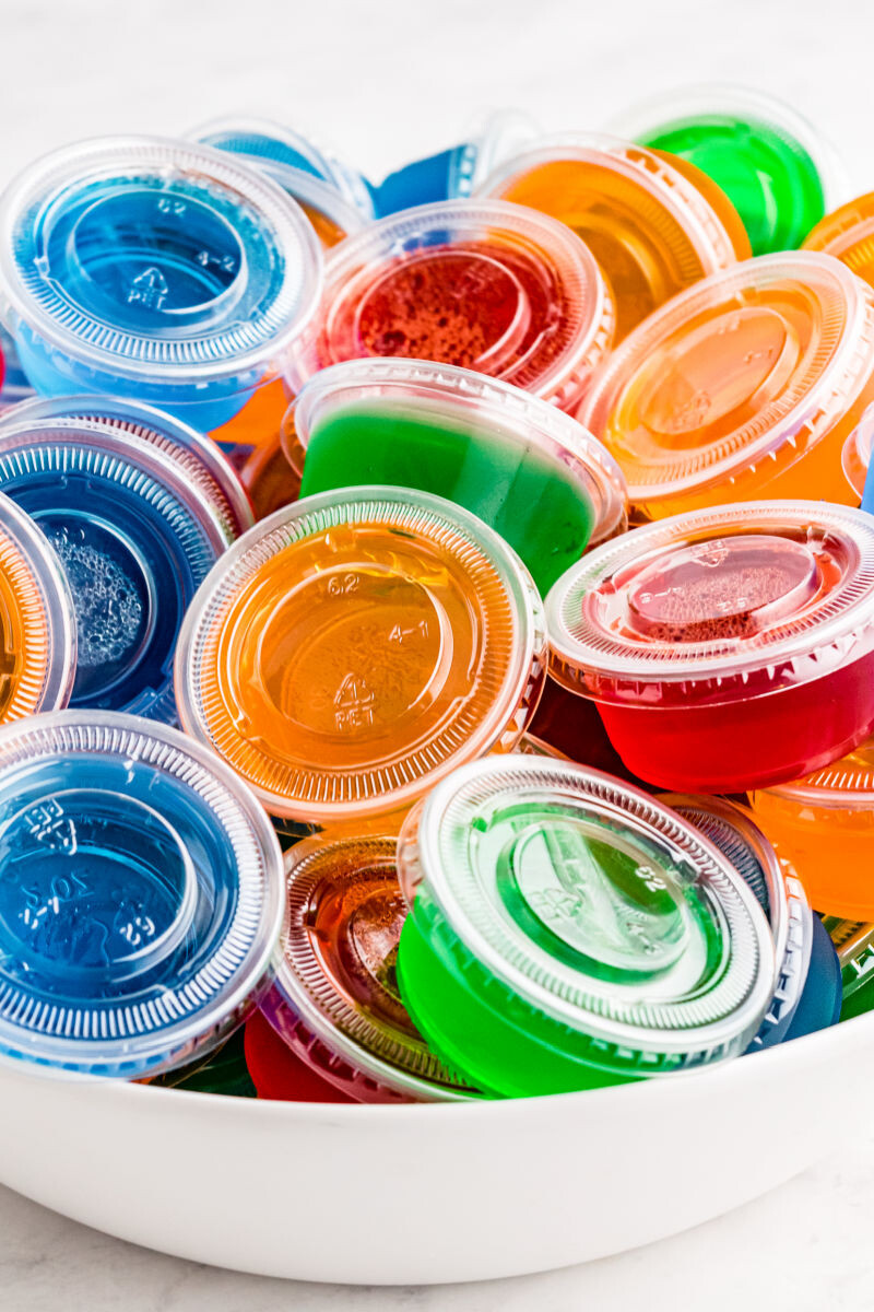 close up of jello shots in a white bowl