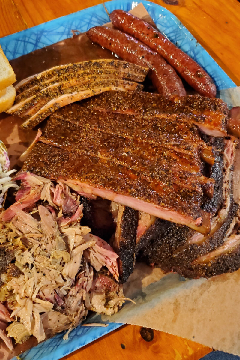 close up of sausages, turkey, ribs, brisket, and pulled pork at Franklin Barbecue