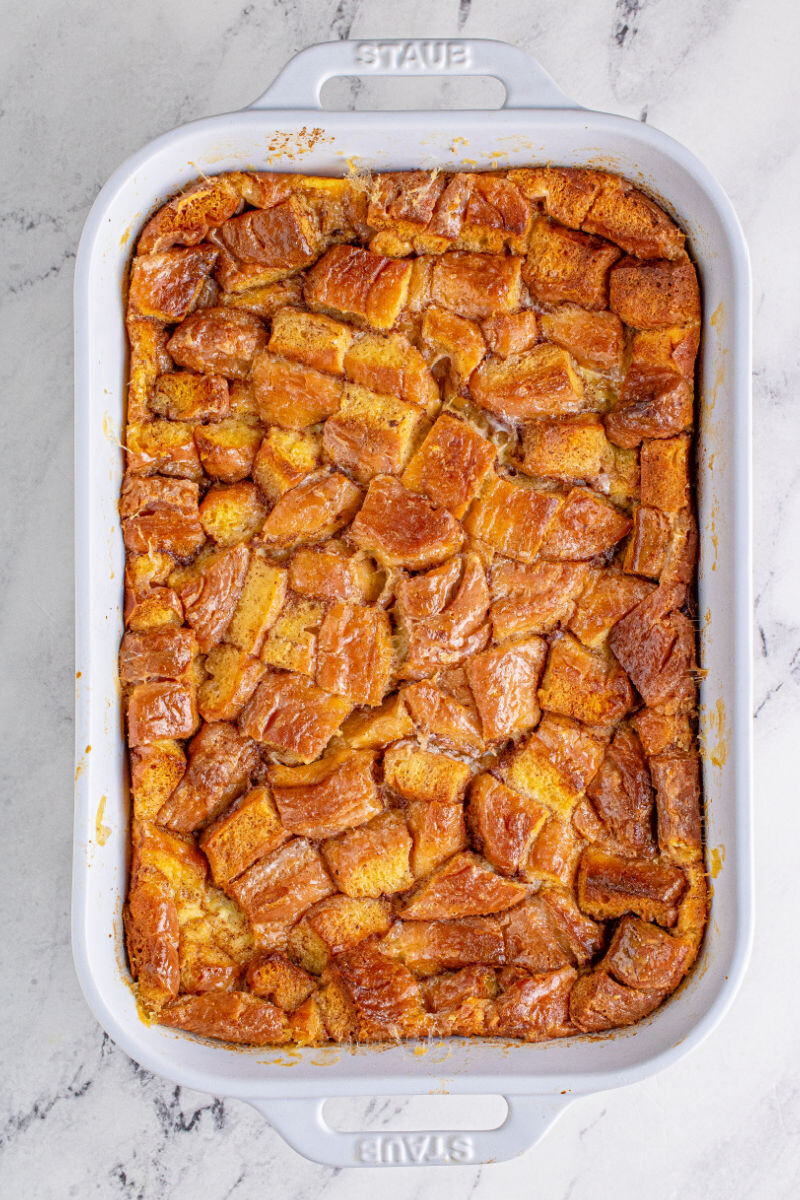 baked honey bun bread pudding in a baking dish