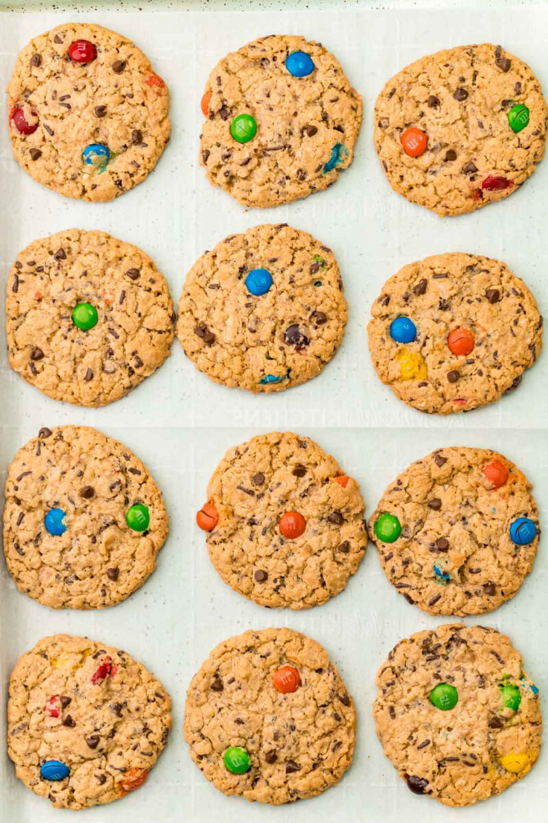 monster cookies on baking sheet after baking