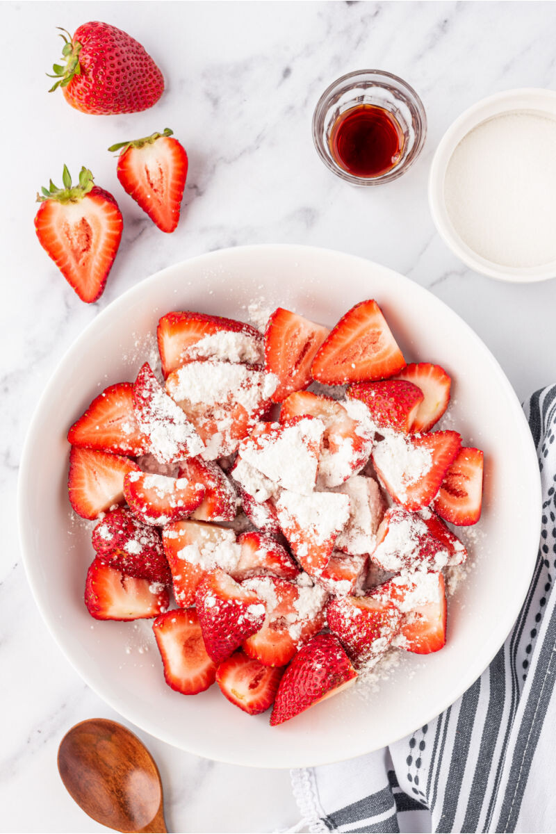 strawberries with cornstarch in a mixing bowl