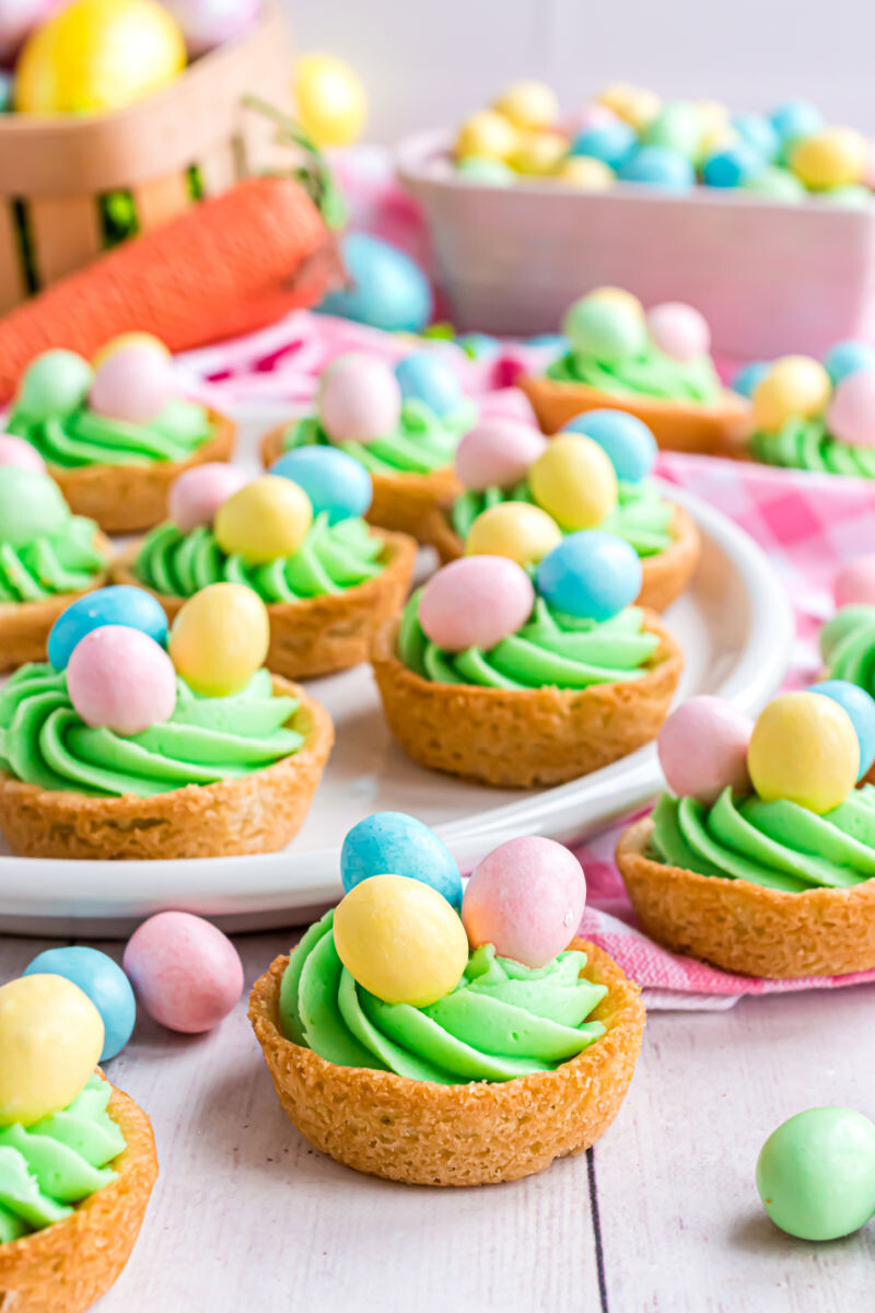 easter egg sugar cookie cups topped with candy coated chocolate eggs