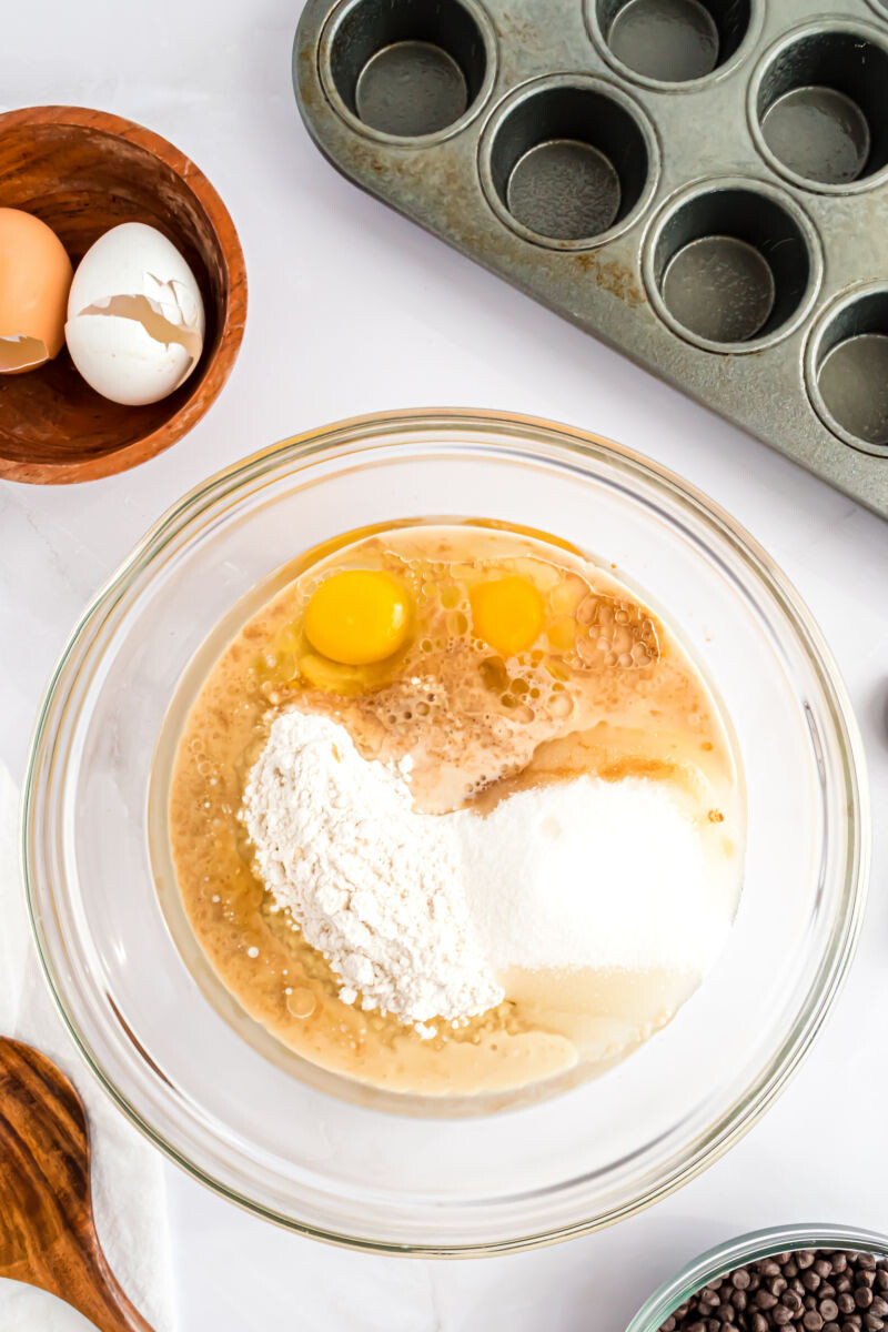 pancake mix, oil, milk, eggs, sugar, and vanilla in a mixing bowl