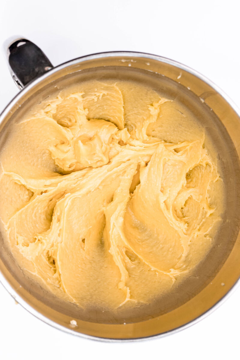 choux pastry dough in a mixing bowl after the eggs have been mixed in