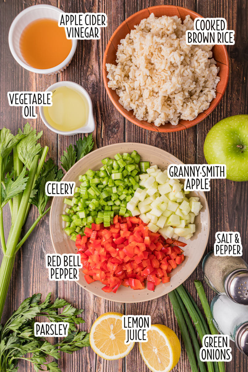 ingredients to make apple & brown rice salad with text labels