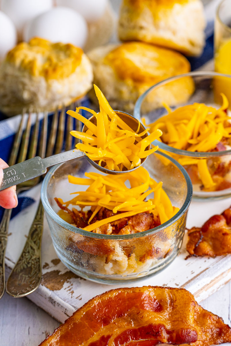 diced potatoes, crumbled bacon, and shredded sharp cheddar added to an 8-ounce glass bowl