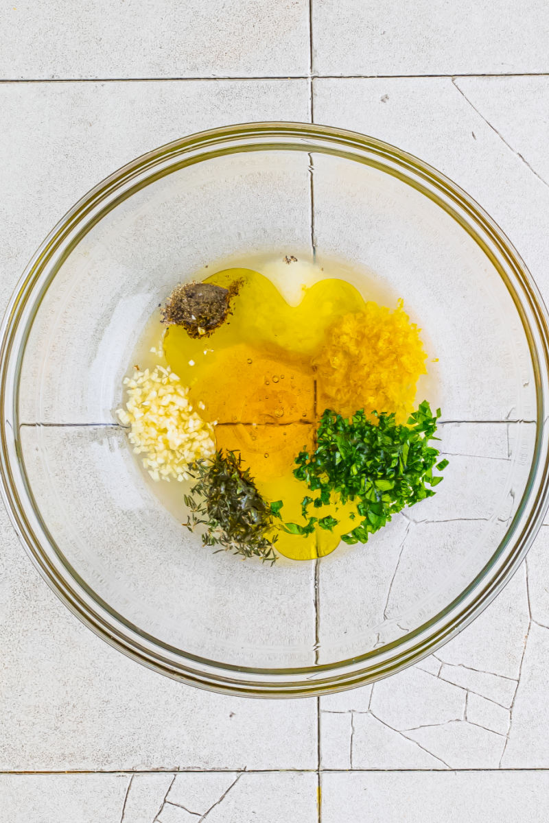 lemon garlic chicken marinade ingredients in a glass bowl