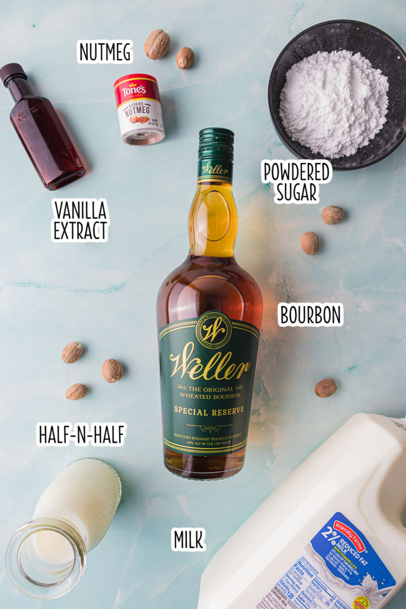 ingredients to make bourbon milk punch with text labels