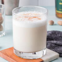 square image of bourbon milk punch in a rocks glass