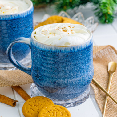 square image of copycat starbucks gingerbread latte next to gingerbread cookies and cinnamon sticks