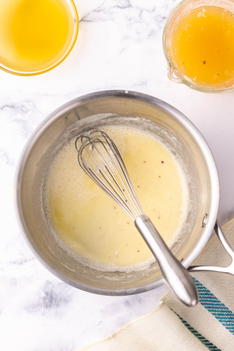 roux whisked together in a saucepan