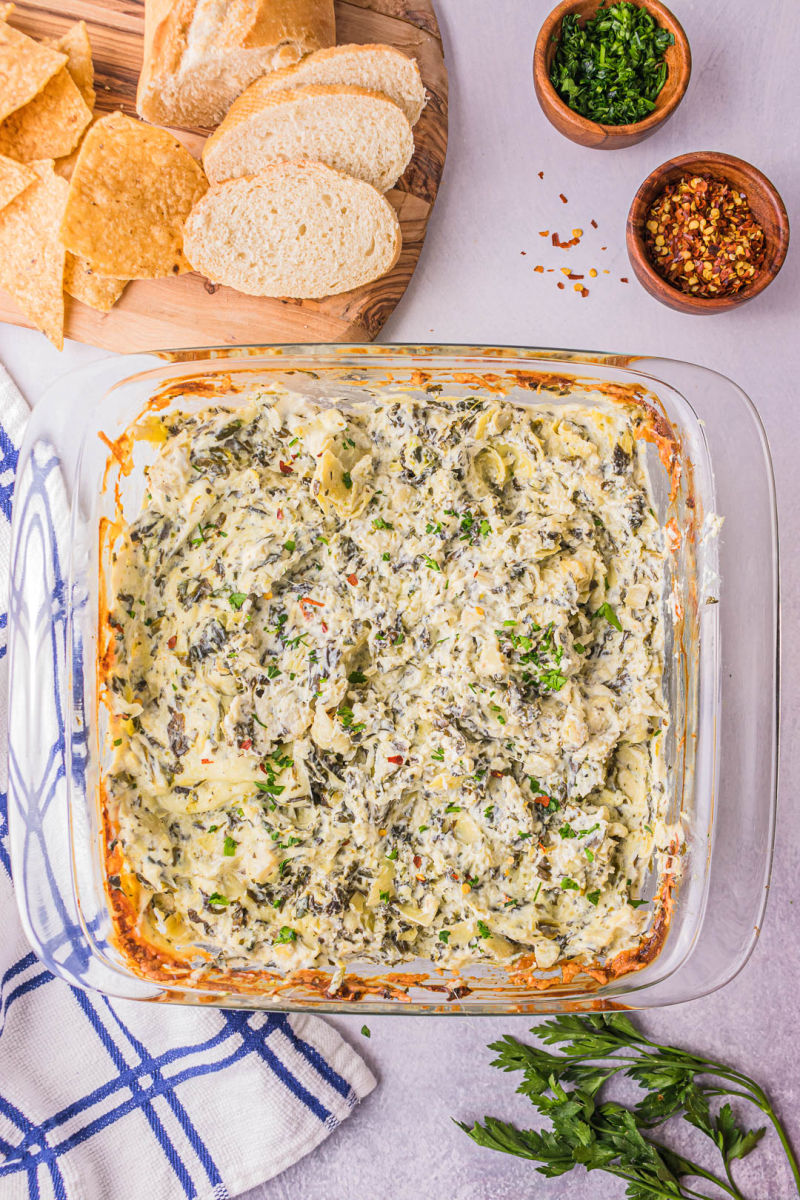baked spinach artichoke dip in a square dish