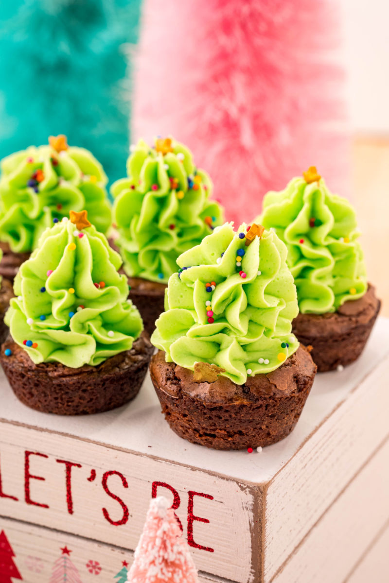 christmas tree brownie bites on a wooden serving tray