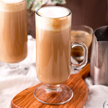 square image of a copycat starbucks vanilla latte on a wooden serving board