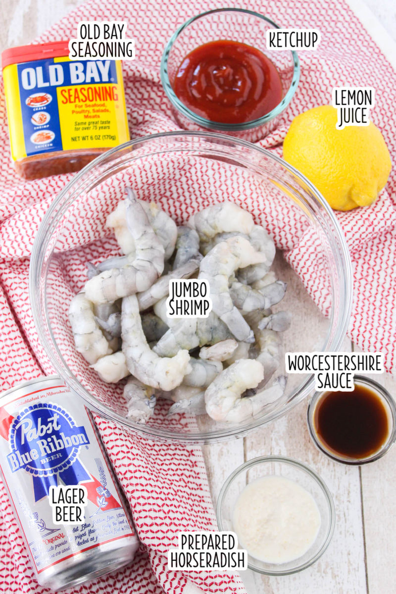 ingredients to make shrimp cocktail and cocktail sauce with text labels