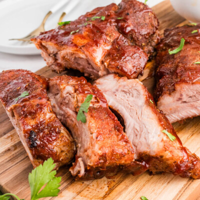 square image of dry rub ribs cut into individual bones on a cutting board