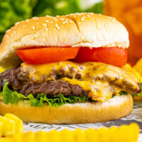 square image of a double smash burger with lettuce and tomato